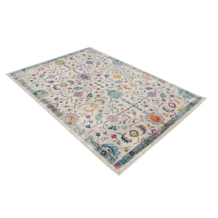 Tappeto vintage con motivo floreale in beige, blu, giallo e rosa.