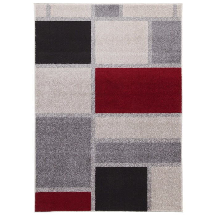 Tappeto moderno con motivo geometrico in grigio, nero e rosso.