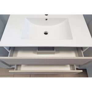 t.b.t. Mobile bagno con cassetti e lavabo bianco.