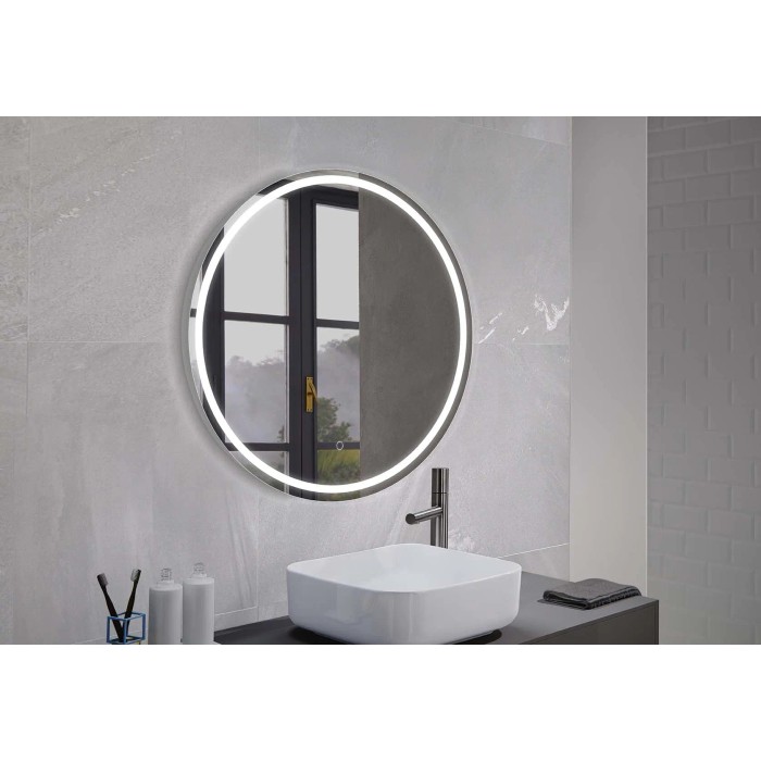 Specchio t.b.t. rotondo con illuminazione LED in bagno.