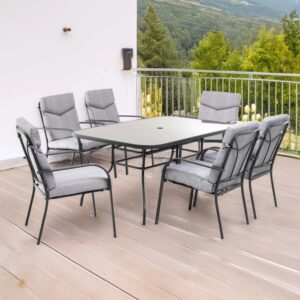 Set di mobili da giardino t.b.t. con tavolo e 6 sedie, cuscini grigi.