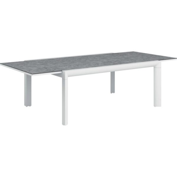 Tavolo da giardino moderno t.b.t. con piano grigio e struttura bianca.