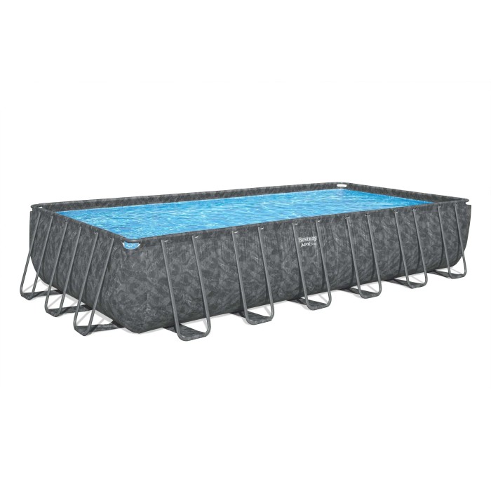 Piscina rettangolare fuori terra con struttura in acciaio e rivestimento grigio, riempita con acqua blu.