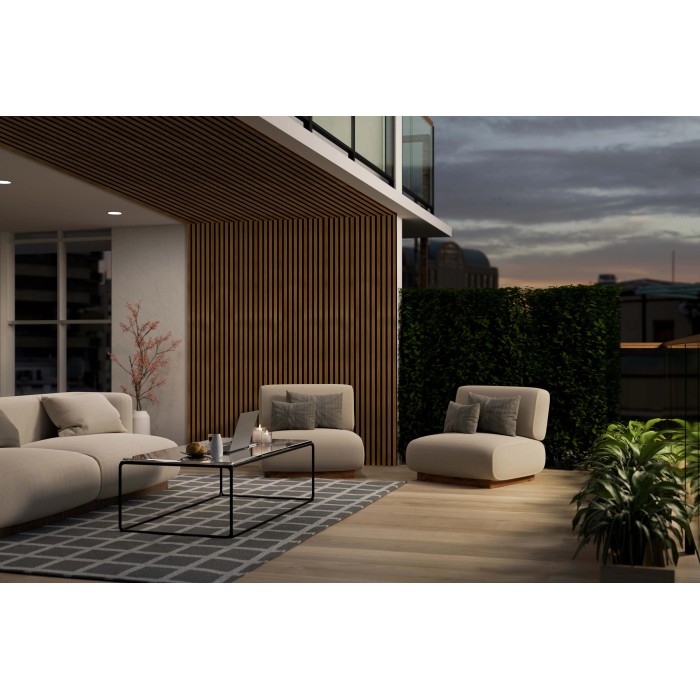 Soggiorno con pannelli a parete t.b.t. e mobili beige.