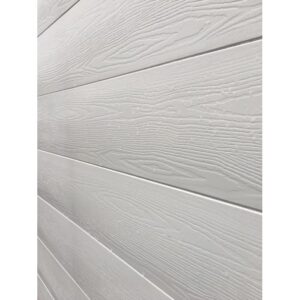 Rivestimento murale t.b.t. bianco con texture legno per interni ed esterni.
