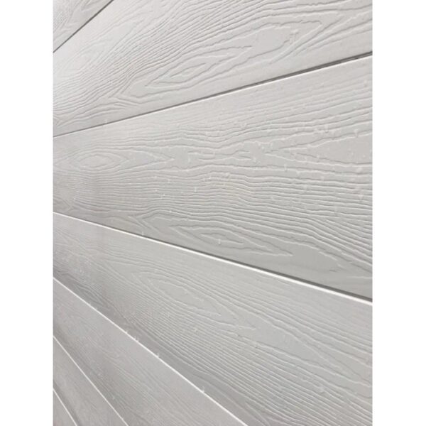 Rivestimento murale t.b.t. bianco con texture legno per interni ed esterni.