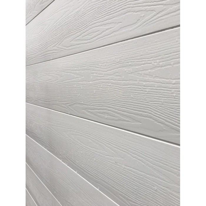 Rivestimento murale t.b.t. bianco con texture legno per interni ed esterni.