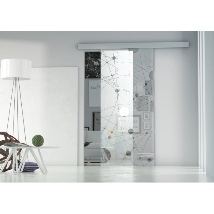 Porta scorrevole in vetro t.b.t. con design moderno a punti e linee per una divisione elegante degli spazi.