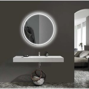Specchio LED rotondo di t.b.t. sopra un mobile bagno bianco.