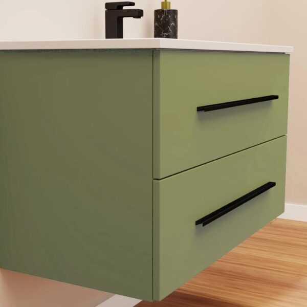 Mobile bagno verde con due cassetti e maniglie nere.