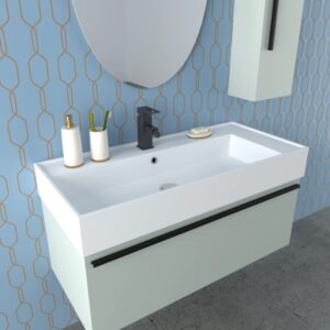 Set di mobili da bagno moderni con lavabo, specchio e mobile base in bianco e verde pastello.