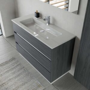 Mobile bagno grigio con tre cassetti e lavabo bianco.