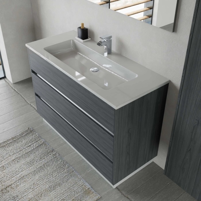 Mobile bagno grigio con tre cassetti e lavabo bianco.