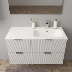 Mobile lavabo t.b.t. con lavabo e cassetti scanalati.