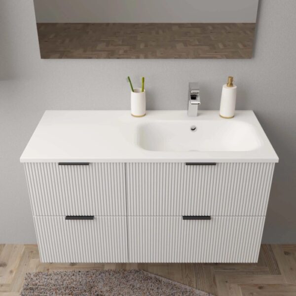 Mobile lavabo t.b.t. con lavabo e cassetti scanalati.