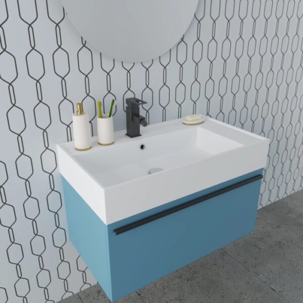t.b.t. Mobile bagno blu con lavabo bianco e rubinetto.