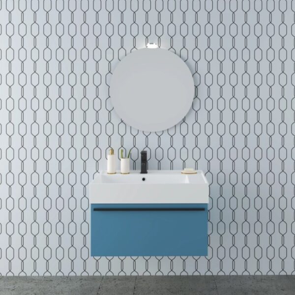 Set di mobili da bagno blu con specchio rotondo e lavabo da appoggio moderno.