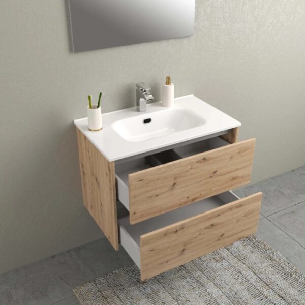Mobile bagno t.b.t. con due cassetti aperti e lavabo da appoggio.
