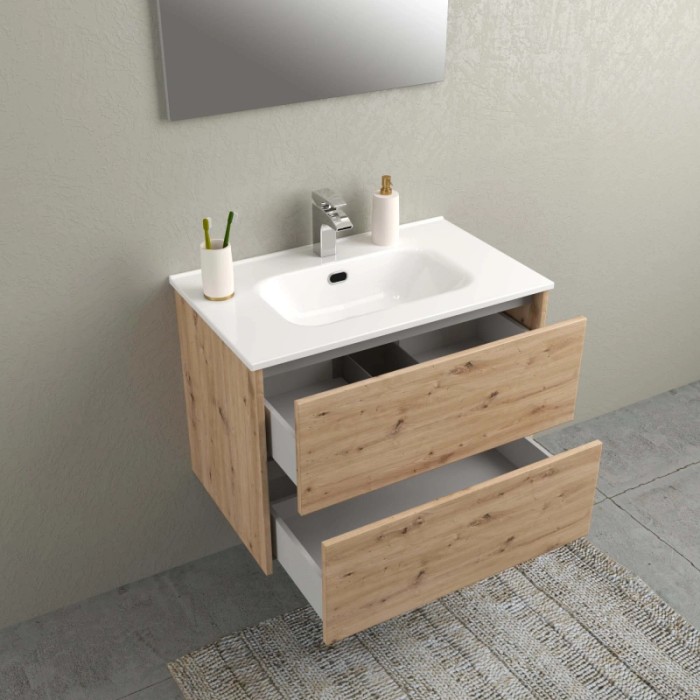 Mobile bagno t.b.t. con due cassetti aperti e lavabo da appoggio.