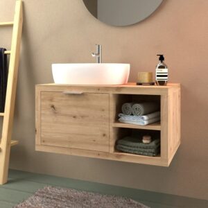 Mobile bagno in legno con lavabo d'appoggio e asciugamani in bagno.