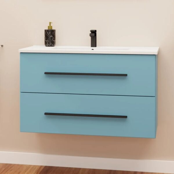 Mobile bagno blu con due cassetti e maniglie nere, parte della serie di arredo bagno.