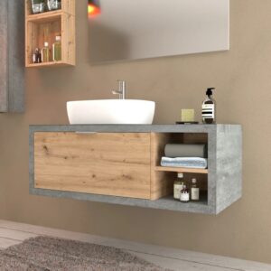 Mobile bagno moderno con lavabo, mobiletto frontale in legno e ripiani.