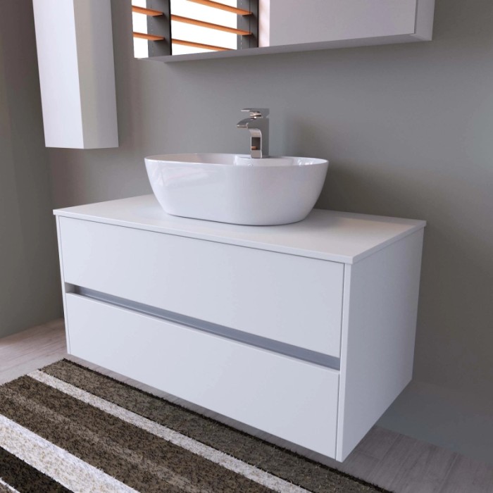 Mobile bagno bianco con lavabo da appoggio e due cassetti. Arredo bagno moderno.