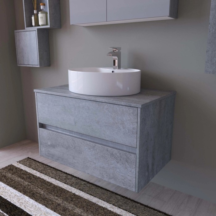 Mobile bagno grigio con lavabo d'appoggio, parte di un set di mobili per il bagno.
