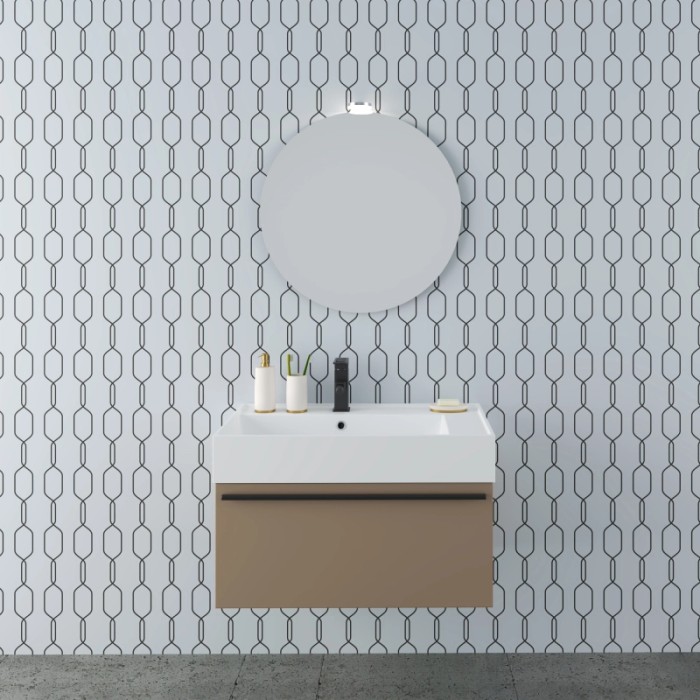 t.b.t. Mobile bagno con specchio e rubinetto davanti a parete decorata. Arredo bagno.