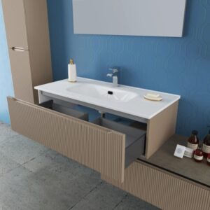 Set di mobili bagno moderni con lavabo, mobile sottolavabo con cassetti e mobile alto in beige.