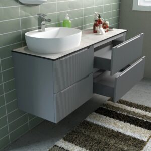 Mobile bagno grigio con lavabo d'appoggio e due cassetti. Arredo bagno.