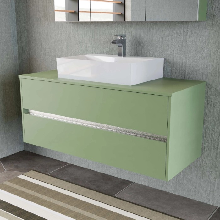Mobile bagno verde con lavabo da appoggio per bagno moderno.