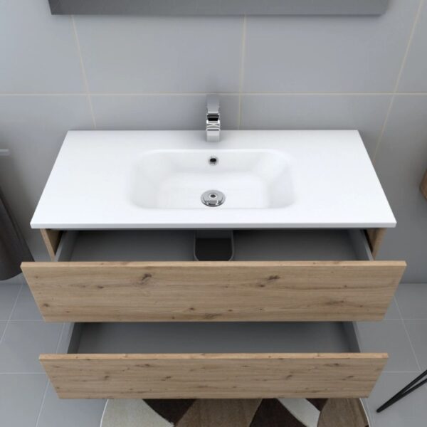 t.b.t. Lavabo singolo con decoro legno e vasca bianca dall'alto.