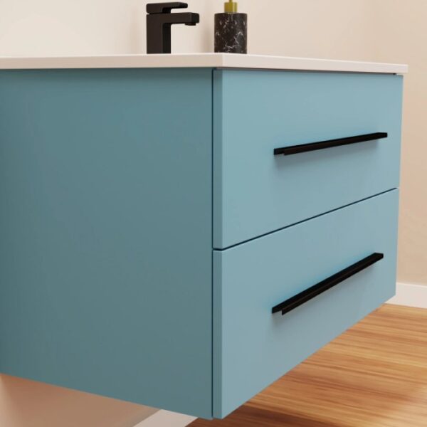 Mobile bagno blu con due cassetti e maniglie nere. Arredo bagno.