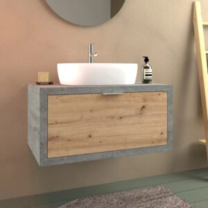 Set di mobili da bagno moderni con lavabo, frontale in legno e aspetto cemento. Ideale per bagni eleganti.