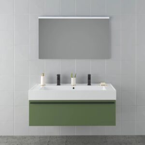 Set di mobili bagno moderni con lavabo, mobile sottolavabo verde e specchio illuminato.