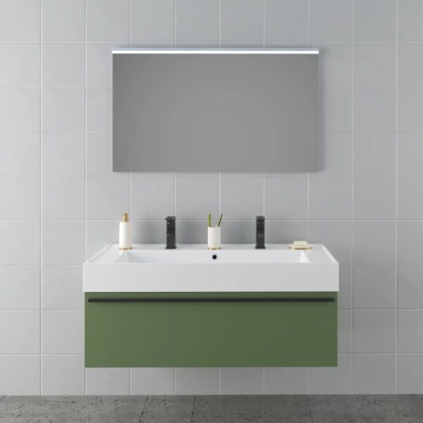 Set di mobili bagno moderni con lavabo, mobile sottolavabo verde e specchio illuminato.