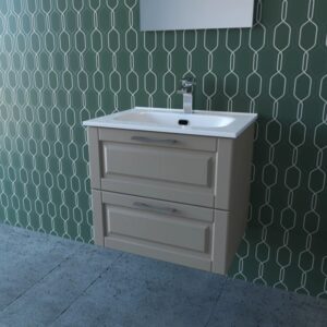 Mobile bagno beige con due cassetti e lavabo da appoggio davanti a una parete decorata.