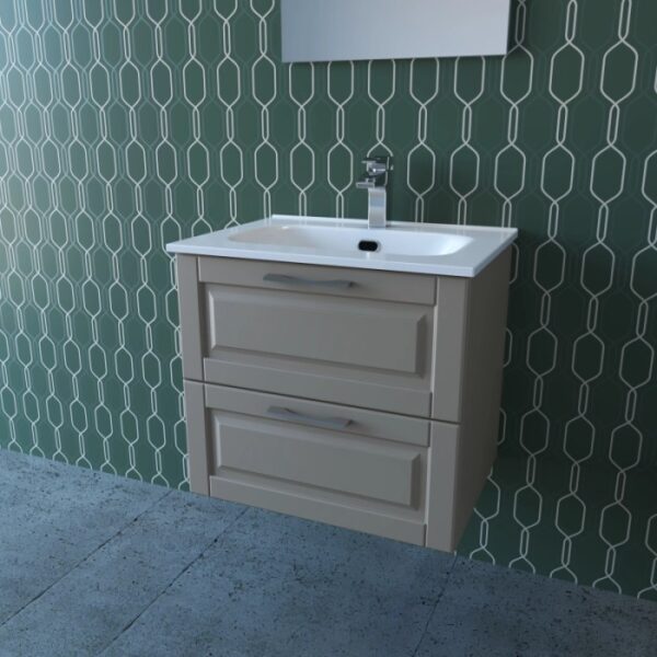 Mobile bagno beige con due cassetti e lavabo da appoggio davanti a una parete decorata.