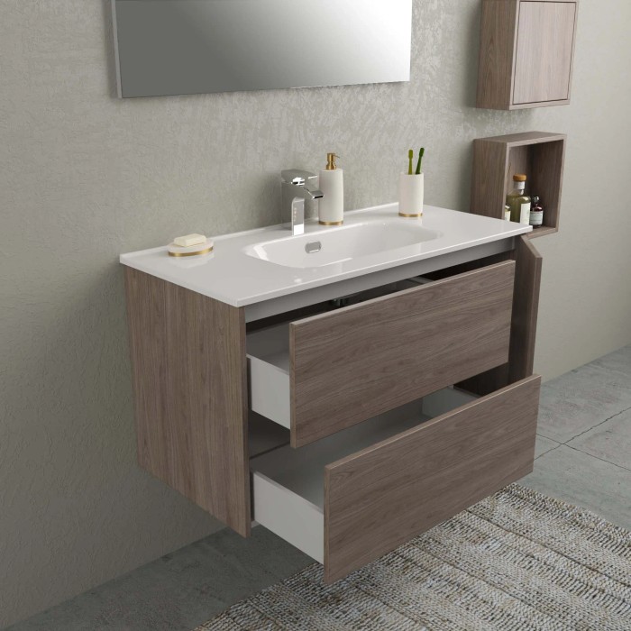 Set di mobili da bagno moderni con lavabo, mobile sottolavabo con cassetti e specchiera.