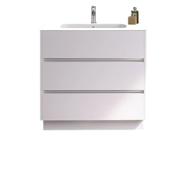 Mobile bagno bianco con tre cassetti e lavabo da appoggio. Arredo bagno.
