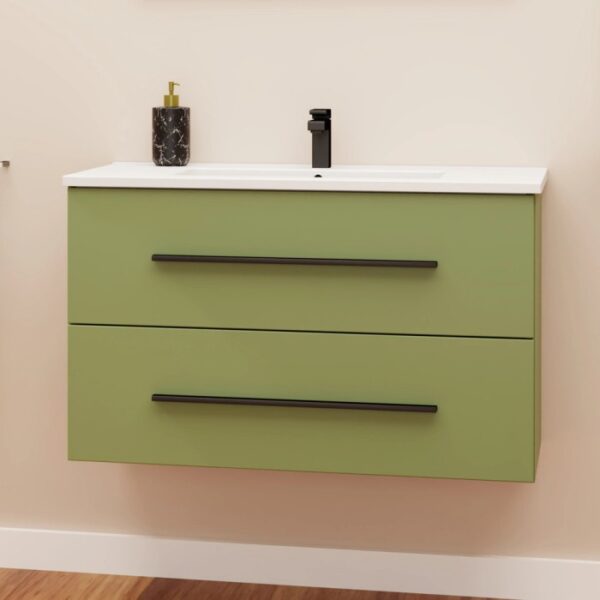 Mobile bagno verde con due cassetti, rubinetto nero e dispenser di sapone.