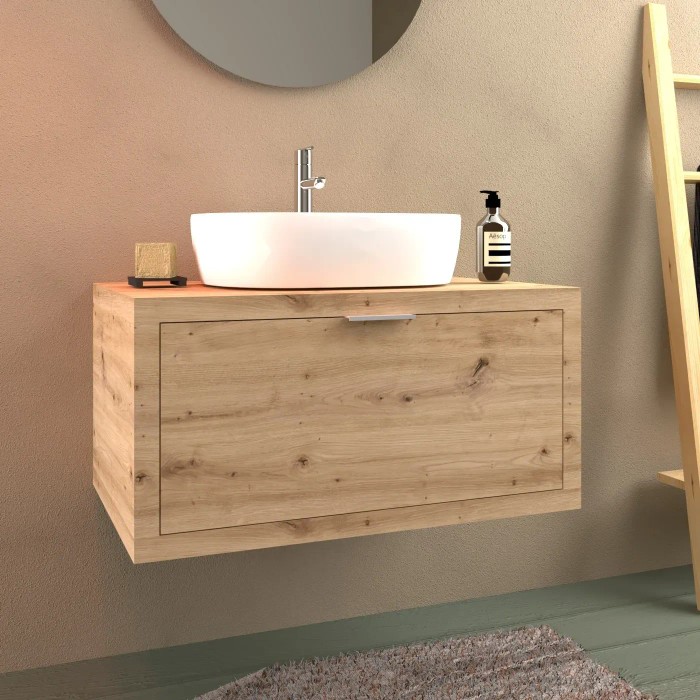 Mobile bagno in legno con lavabo d'appoggio e rubinetto. Arredo bagno per il design del bagno.