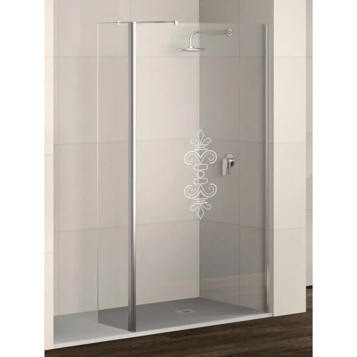 Box doccia walk-in t.b.t. con decoro, profili cromati e soffione.