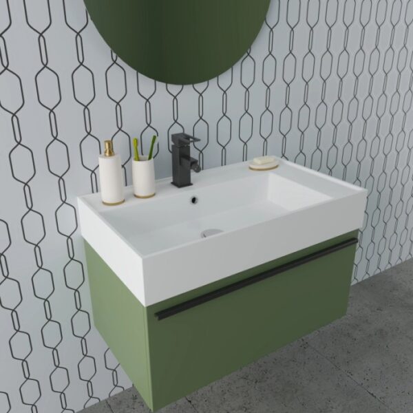 Set di mobili bagno moderni: mobile lavabo verde con lavabo bianco e specchio rotondo.