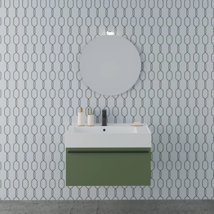 Set di mobili da bagno moderni con mobile lavabo verde, lavabo e specchio rotondo. Design bagno elegante.