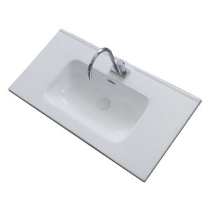 Lavabo da appoggio t.b.t. bianco con rubinetto, vista dall'alto.
